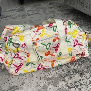 Harajuku Lovers wind it up key weekender bag